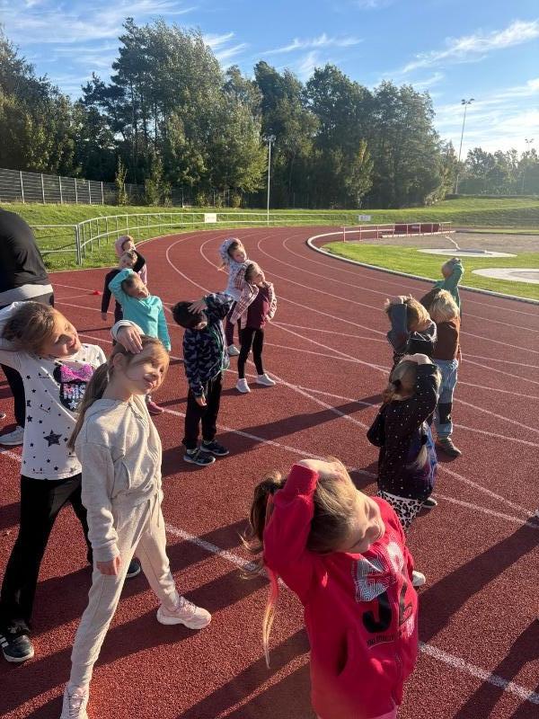 Tělocvik na atletickém stadionu